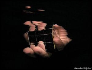 Cube in hand by Veronika Matějková 